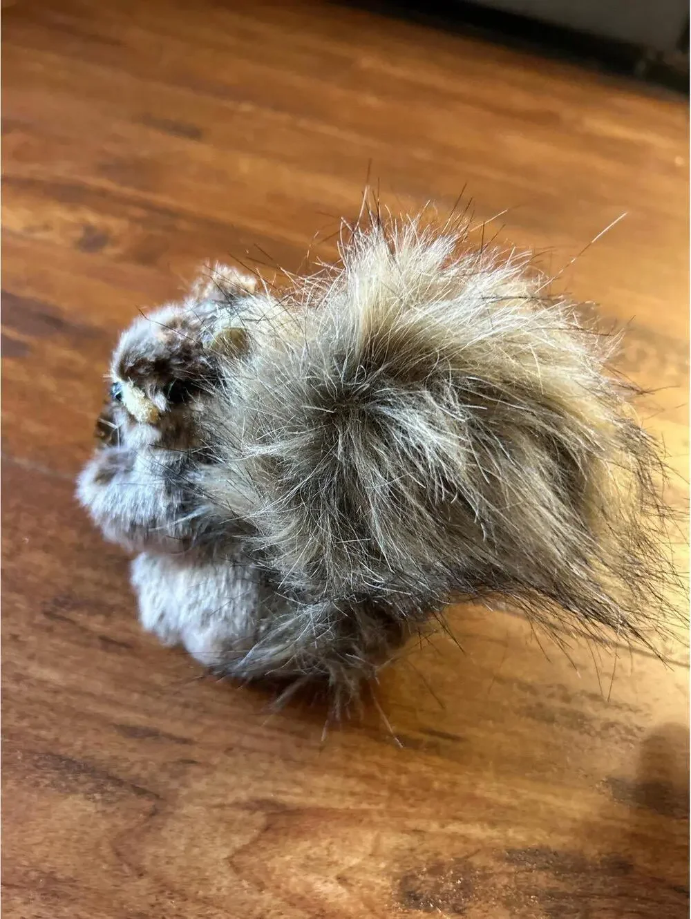 Christmas vintage faux-fur squirrel figurine holding a pinecone